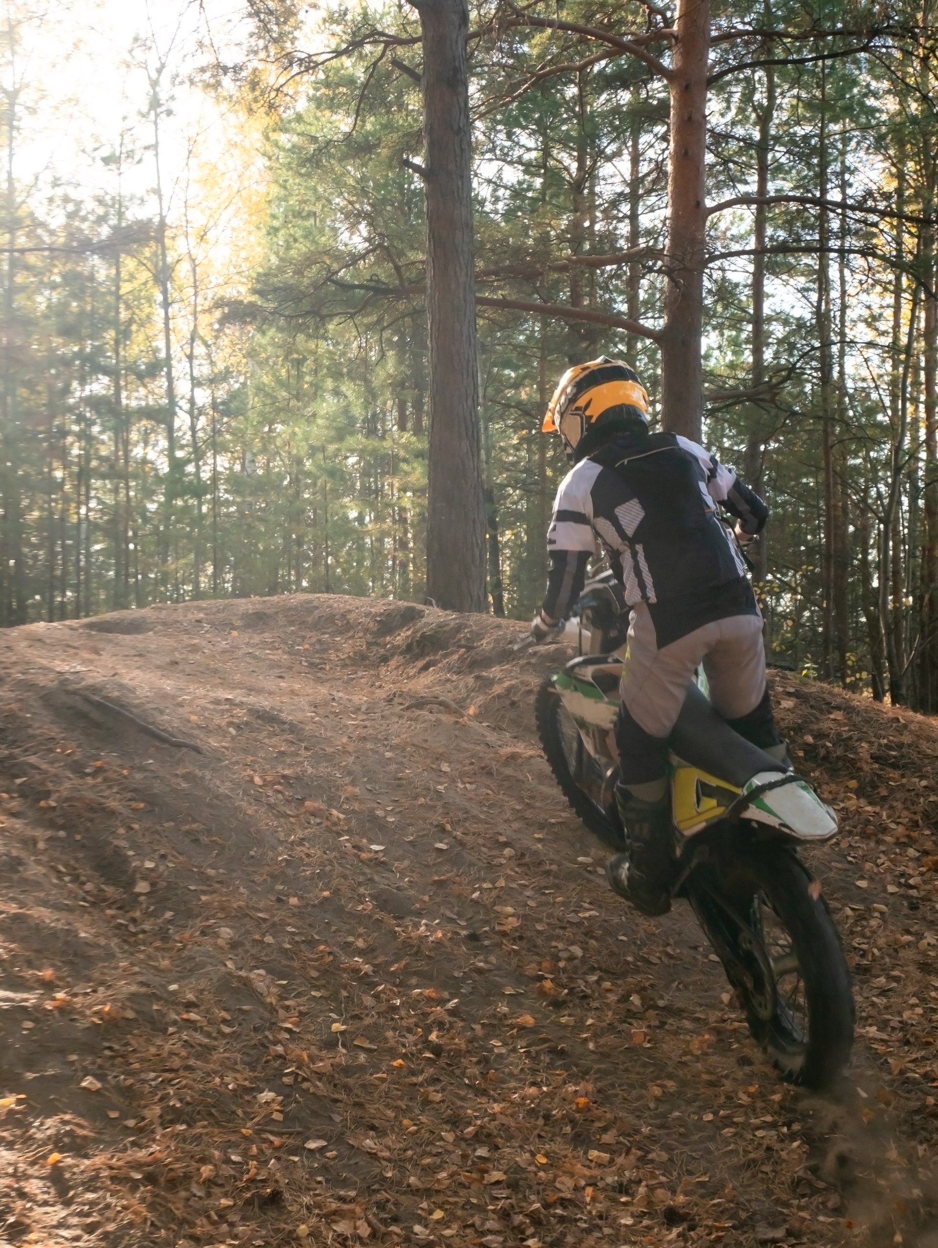 Enduro rider climbing steep hill